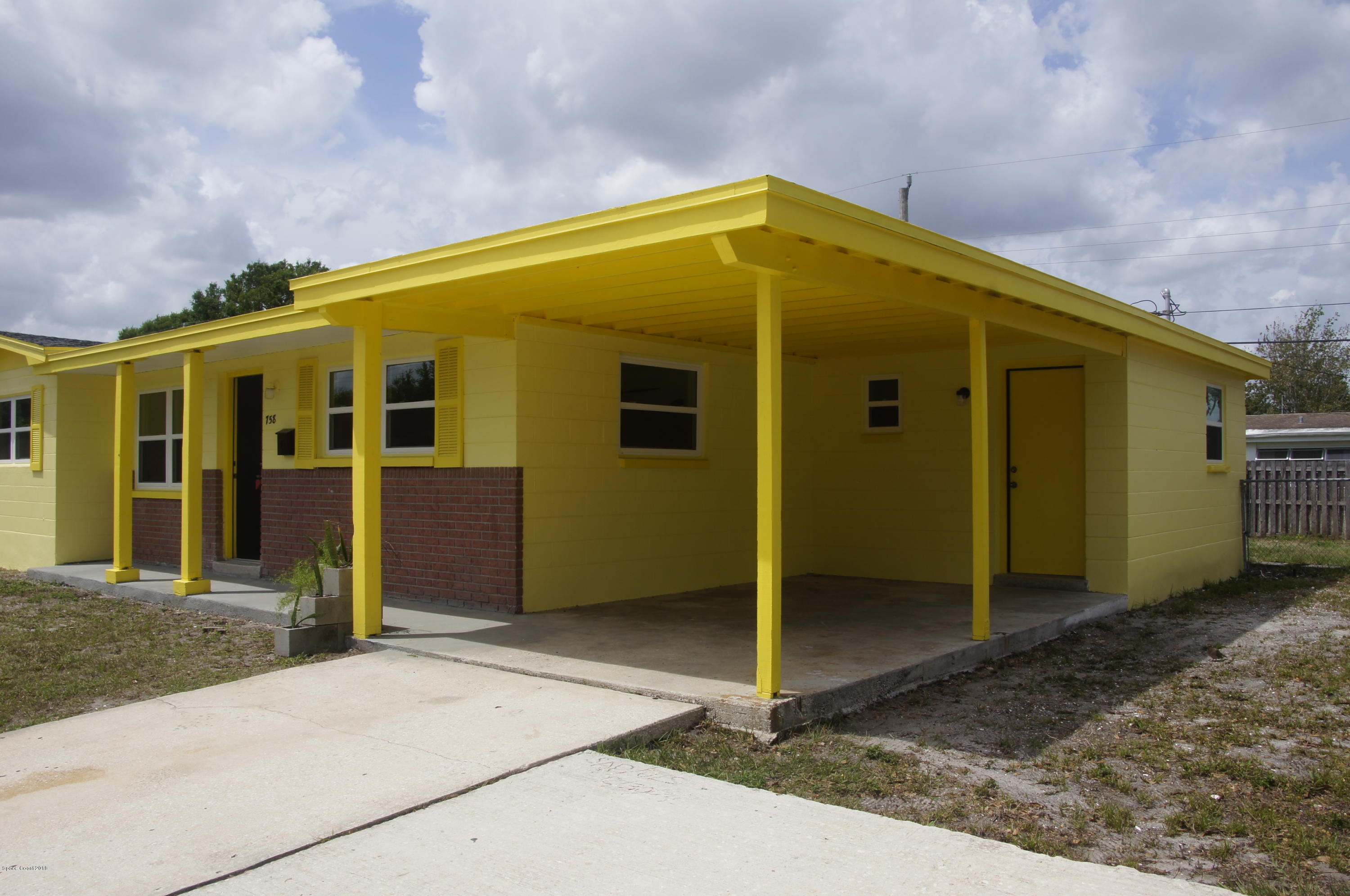 758 Croton Road Melbourne, FL 32935 - Photo 26 of 36 758 Croton Exterior Carport_DSC1450