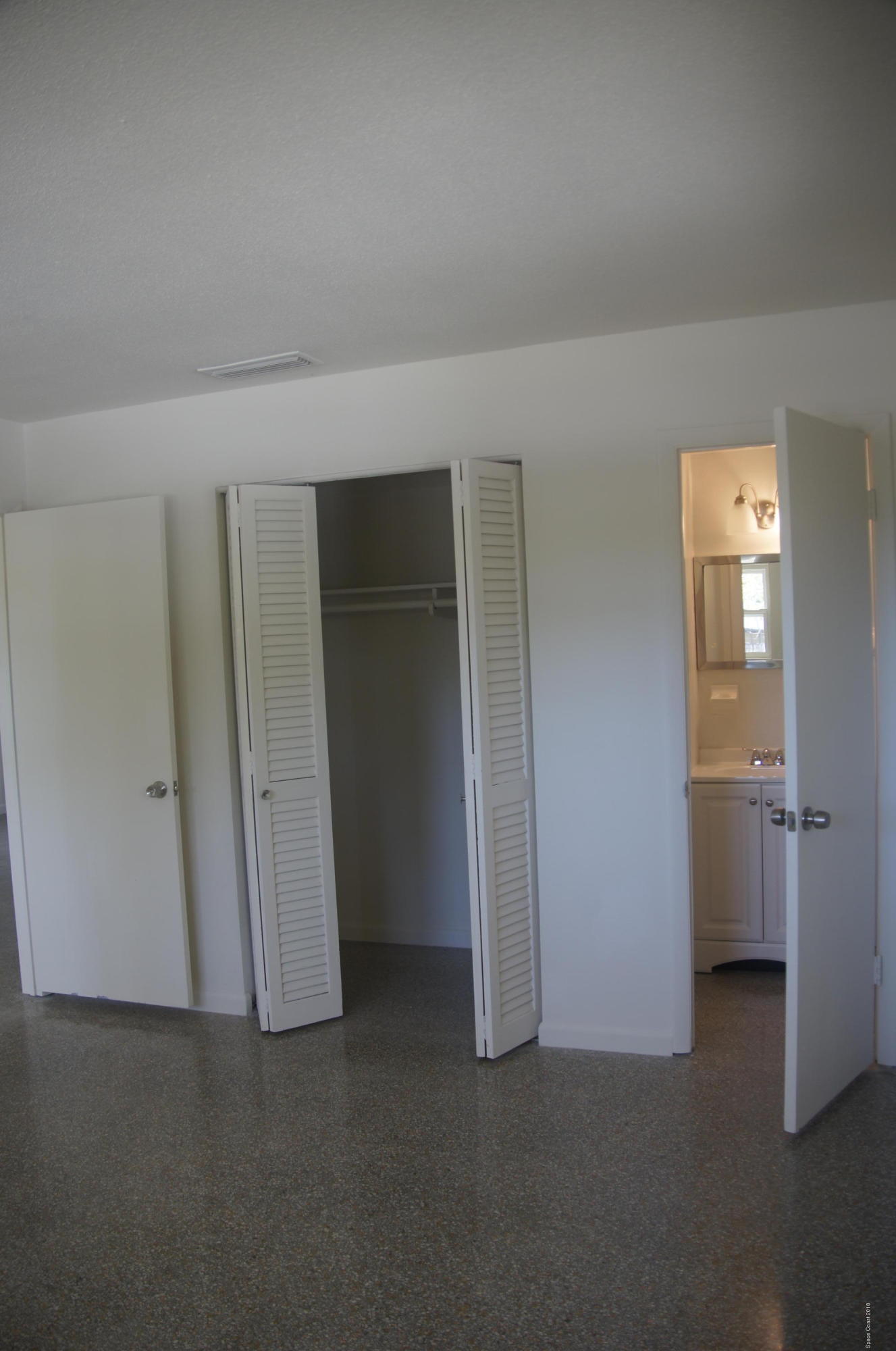758 Croton Road Melbourne, FL 32935 - Photo 27 of 36 758 Croton Master Closet n Bath_DSC1446