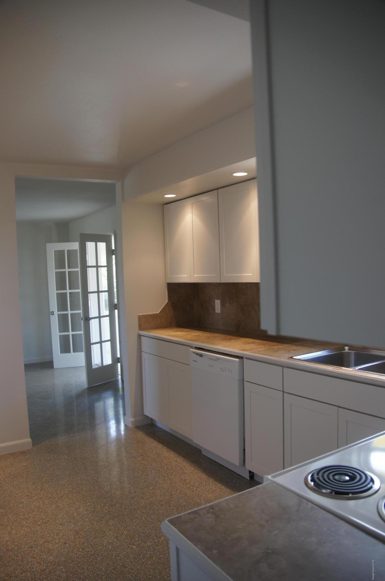 758 Croton Road Melbourne, FL 32935 - Photo 5 of 36 758 Kitchen from Laundry_DSC1448