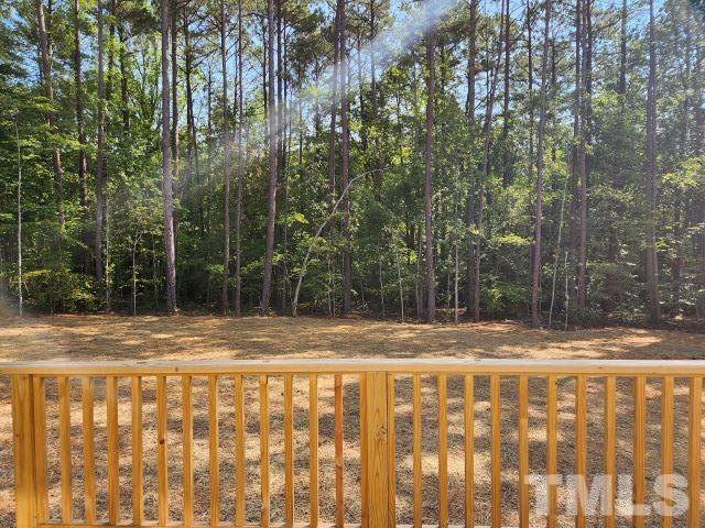 6237 Reagan Lane Wake Forest, NC 27587 - Photo 19 of 22 a view of a yard with trees