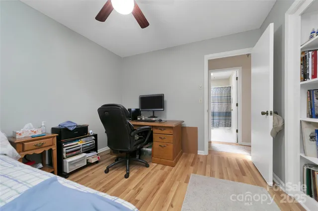 a room with furniture and a dresser