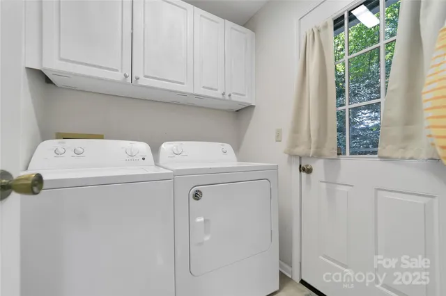 a bedroom with furniture and a ceiling fan