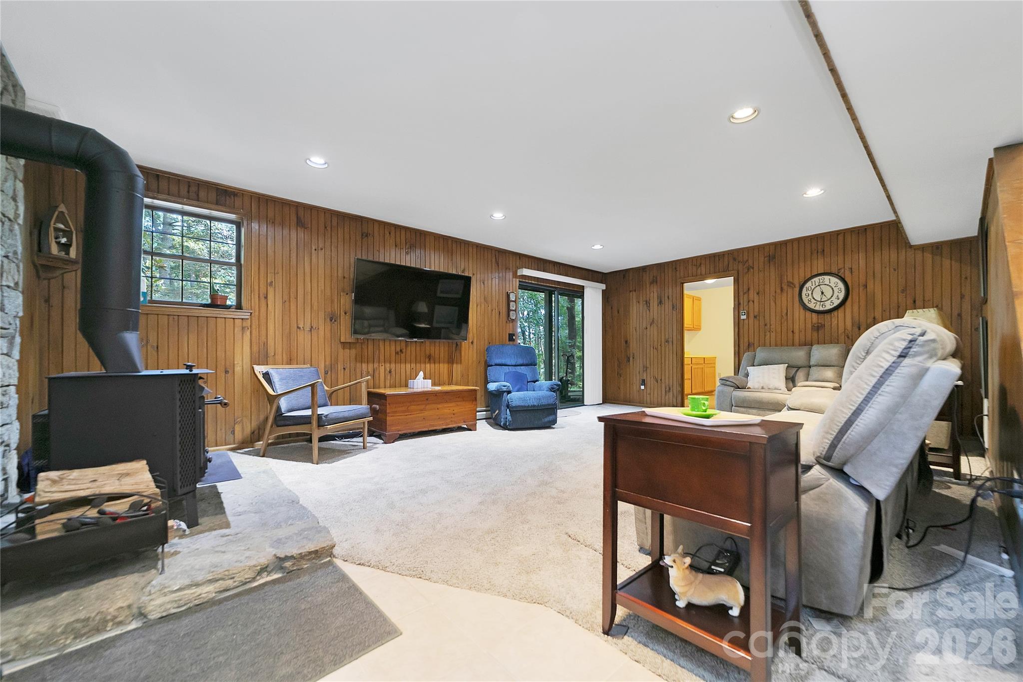 239 Three Mile Knob Road Pisgah Forest, NC 28768 - Photo 35 of 48 a living room with furniture and a flat screen tv