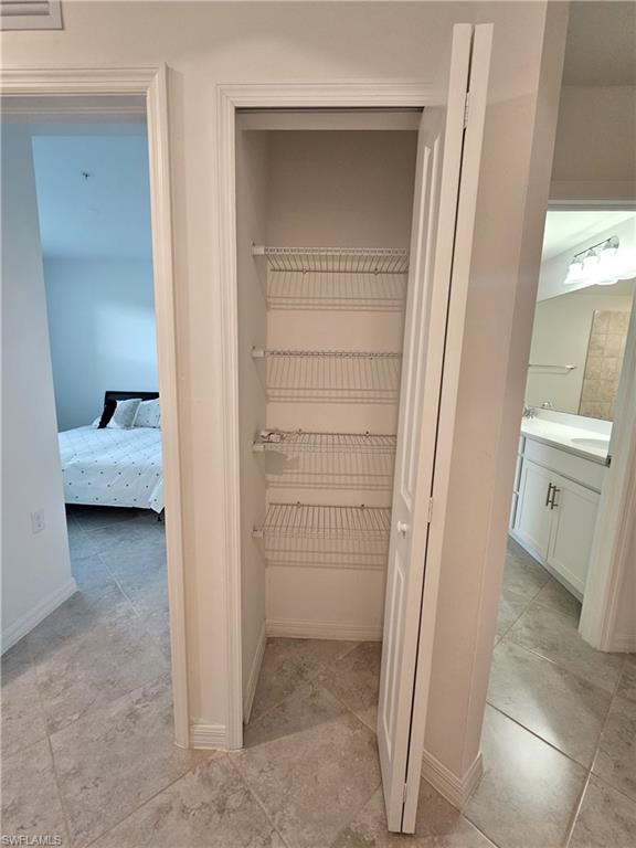 5835 Double Eagle Circle, Unit 4711 Immokalee, FL 34142 - Photo 22 of 44 a view of bedroom and bathroom