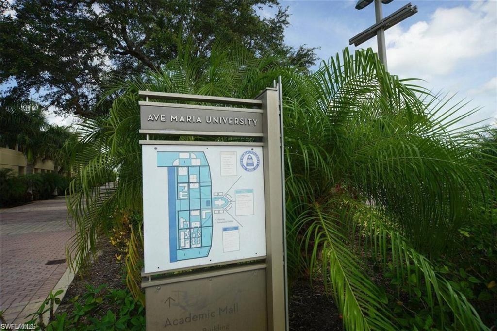 5835 Double Eagle Circle, Unit 4711 Immokalee, FL 34142 - Photo 43 of 44 a view of a backyard of the house