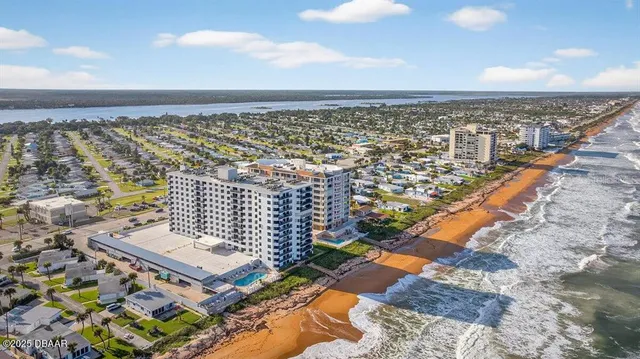 a view of a balcony with chair and table
