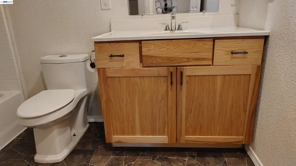 a view of a small space with wooden floor