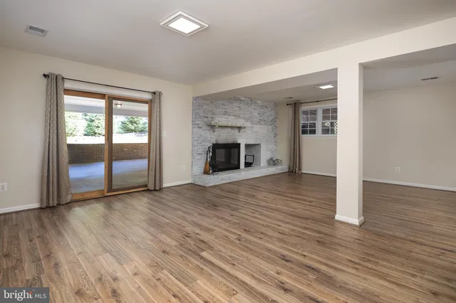 a bathroom with a toilet sink and shower