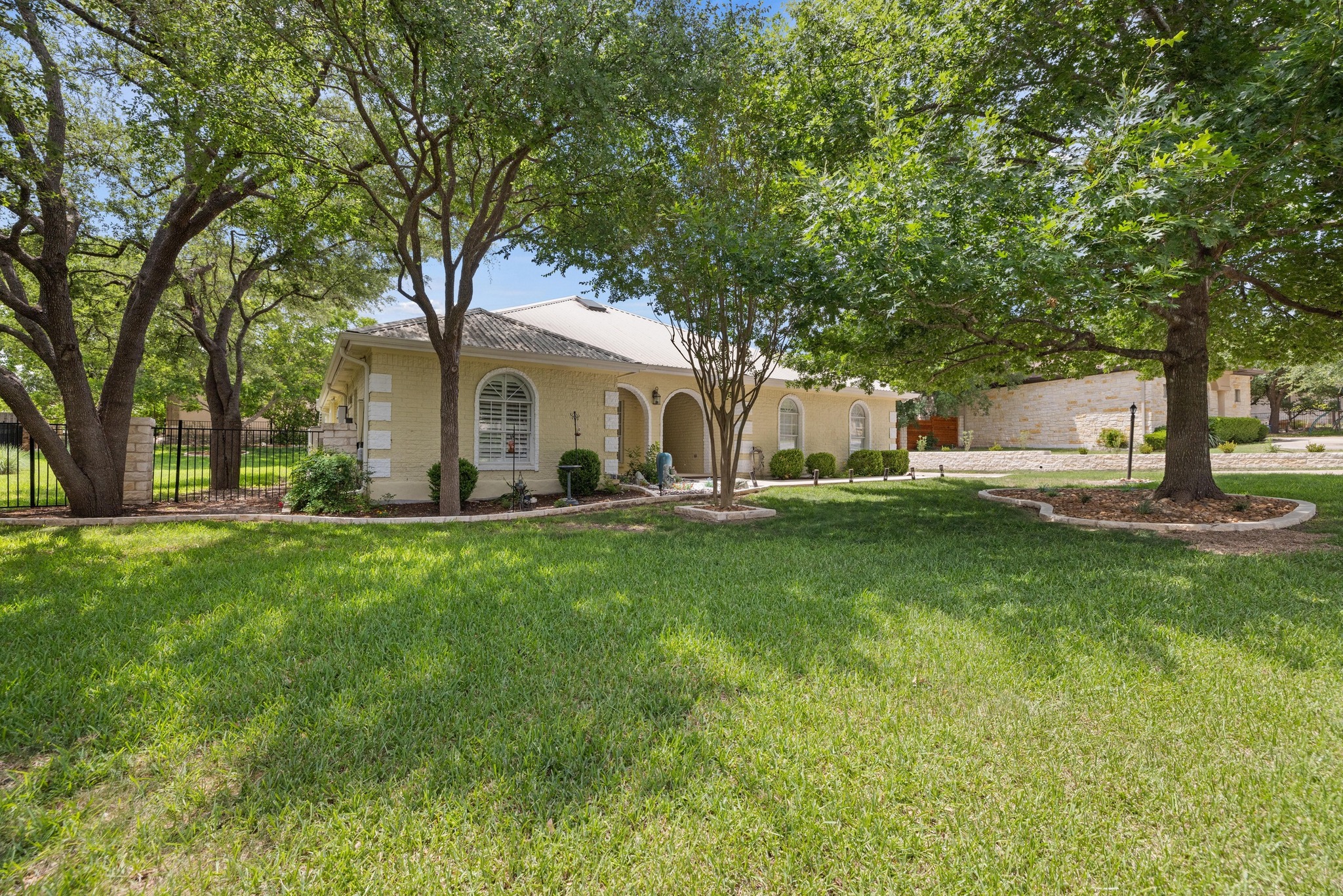 606 Explorer Lakeway, TX 78734 - Photo 12 of 29 Gorgeous, Giant Trees will welcome you home!