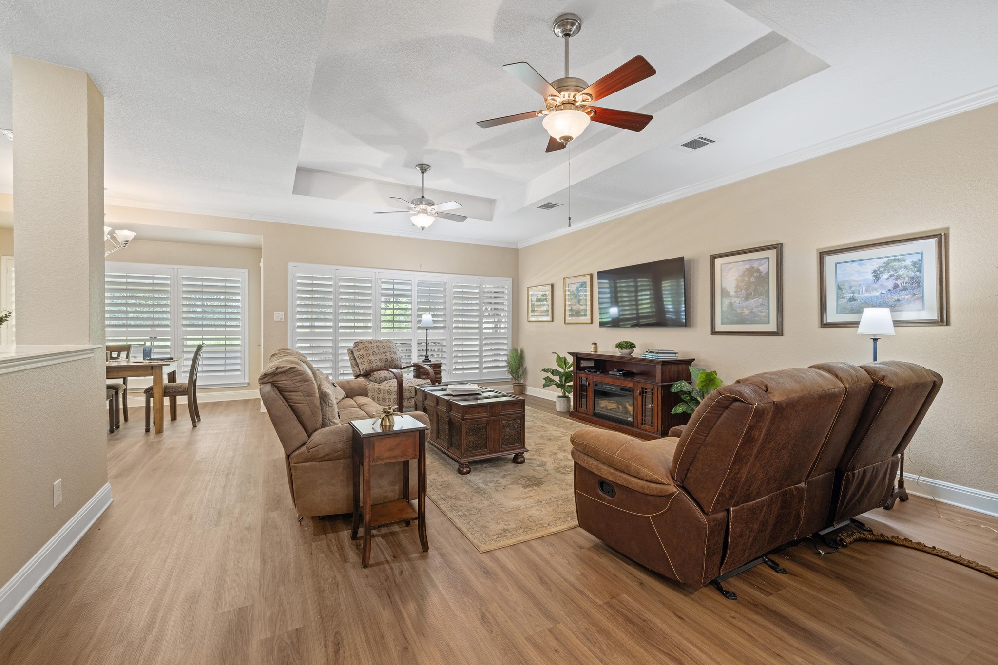 606 Explorer Lakeway, TX 78734 - Photo 16 of 29 Wonderful Living Space (shown here originally staged) has been Spacious & Open to Dining & Kitchen! TV & Faux Fireplace Console can convey to new owners!