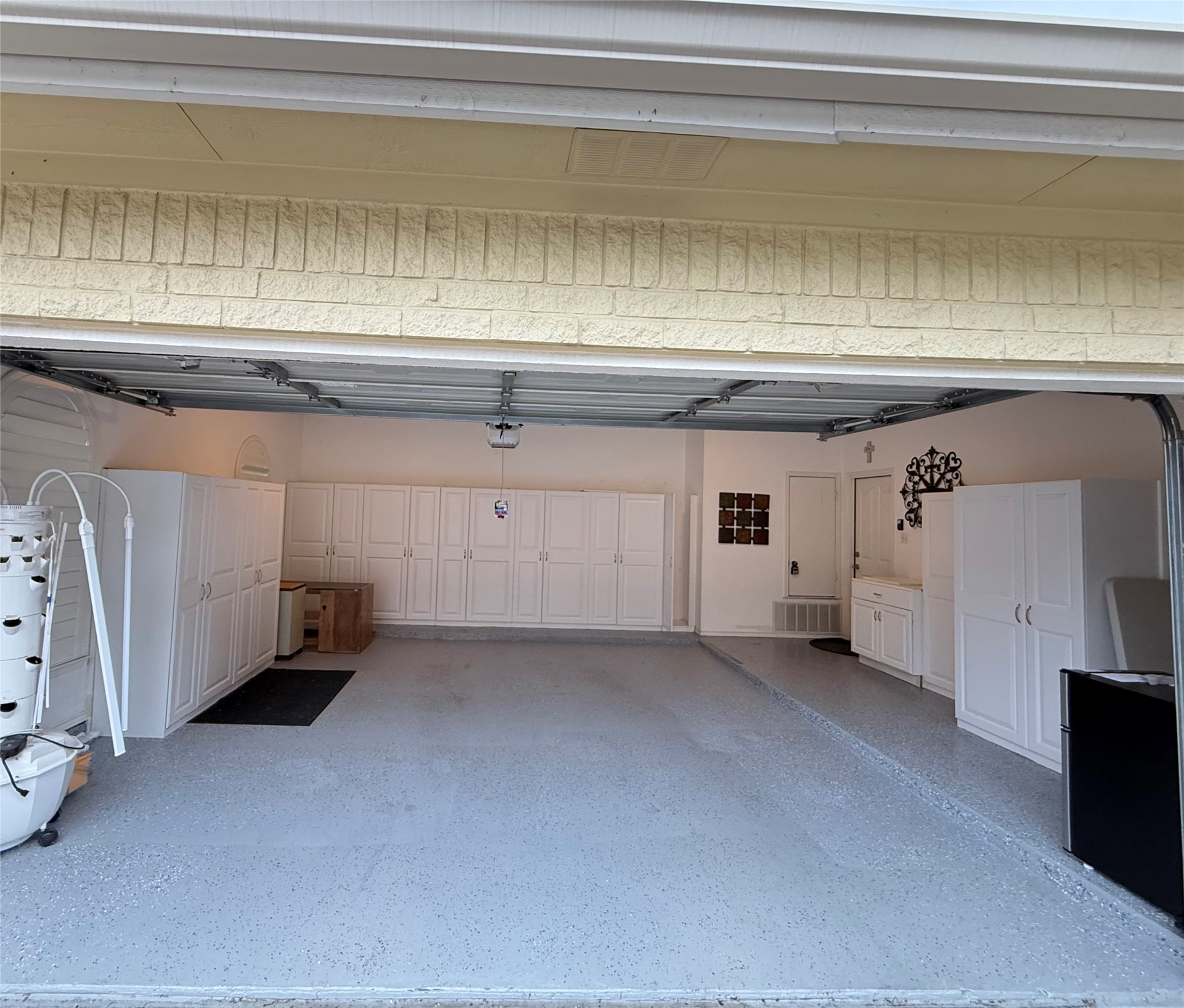 606 Explorer Lakeway, TX 78734 - Photo 22 of 29 Spacious Garage is LOADED with Storage Built-Ins! You'll LOVE the Cabinetry! ESPECIALLY the Christmas Tree Cabinet!