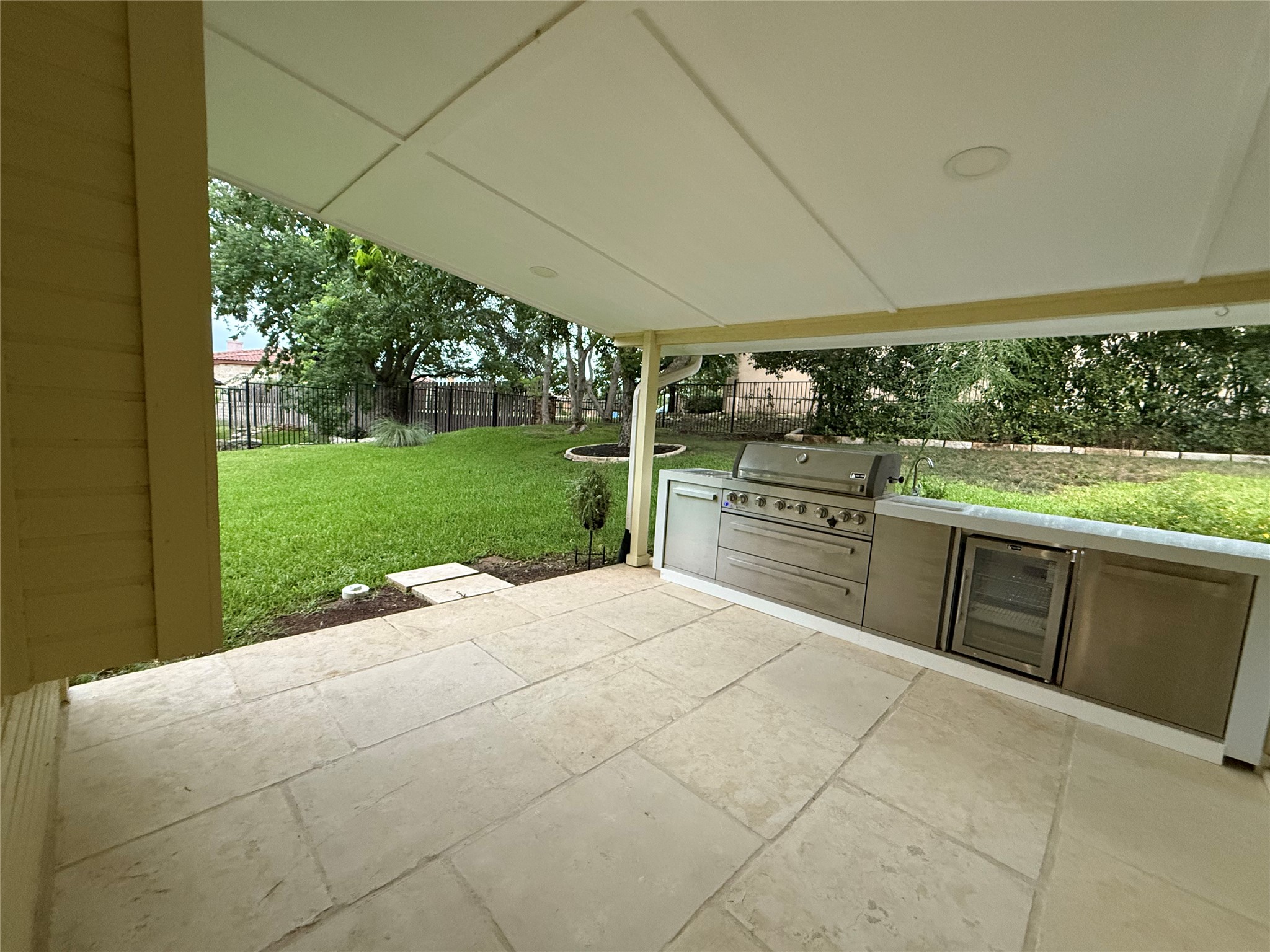 606 Explorer Lakeway, TX 78734 - Photo 10 of 29 Good-Sized, Great Covered Patio features Fantastic Outdoor Kitchen -- Perfect for Entertaining! AND it's Next to the BIG Climate-Controlled Sunroom!