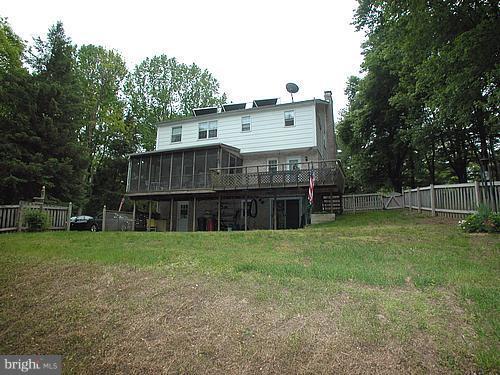 1902 Moore Road Forest Hill, MD 21050 - Photo 1 of 27 a view of a house with backyard and a garden