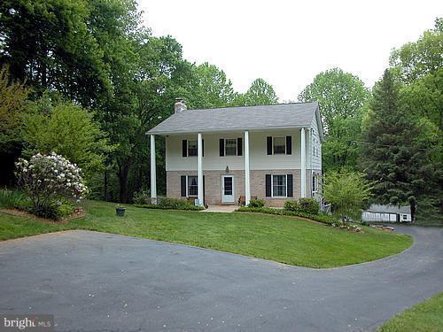 1902 Moore Road Forest Hill, MD 21050 - Photo 11 of 27 a front view of a house with a garden