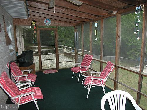 1902 Moore Road Forest Hill, MD 21050 - Photo 21 of 27 a balcony with couple of chairs and a table