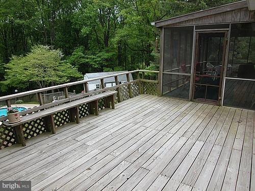 1902 Moore Road Forest Hill, MD 21050 - Photo 4 of 27 a view of deck with wooden floor and fence