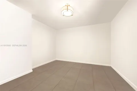 a view of a living room and dining room