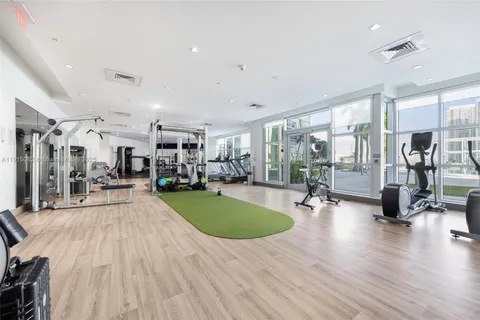 a view of a living room and dining room