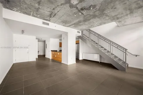 a view of balcony with a yard