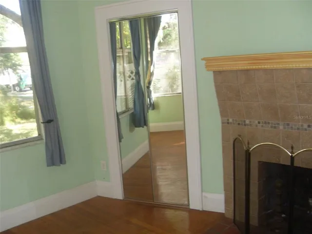 a bathroom with a toilet and bathtub