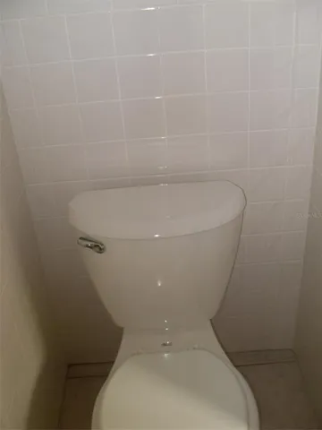 a bathroom with a sink toilet and tub
