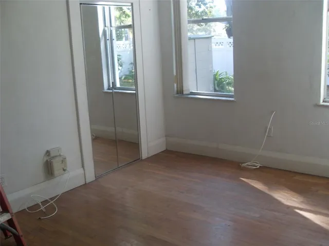 a front view of a house with parking space