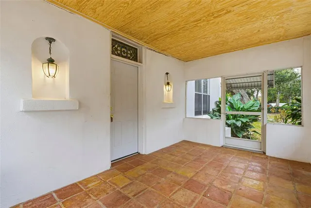 a view of empty room with front door