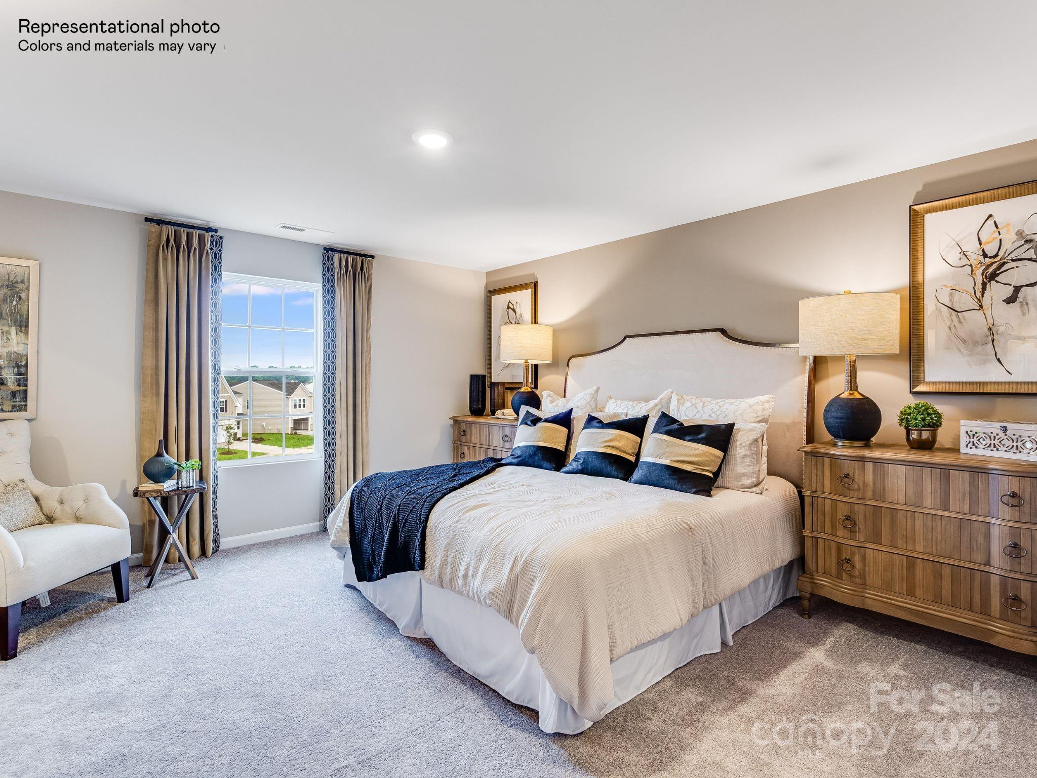 15126 Windy Plns Road Charlotte, NC 28262 - Photo 13 of 23 a bedroom with a bed and a couch