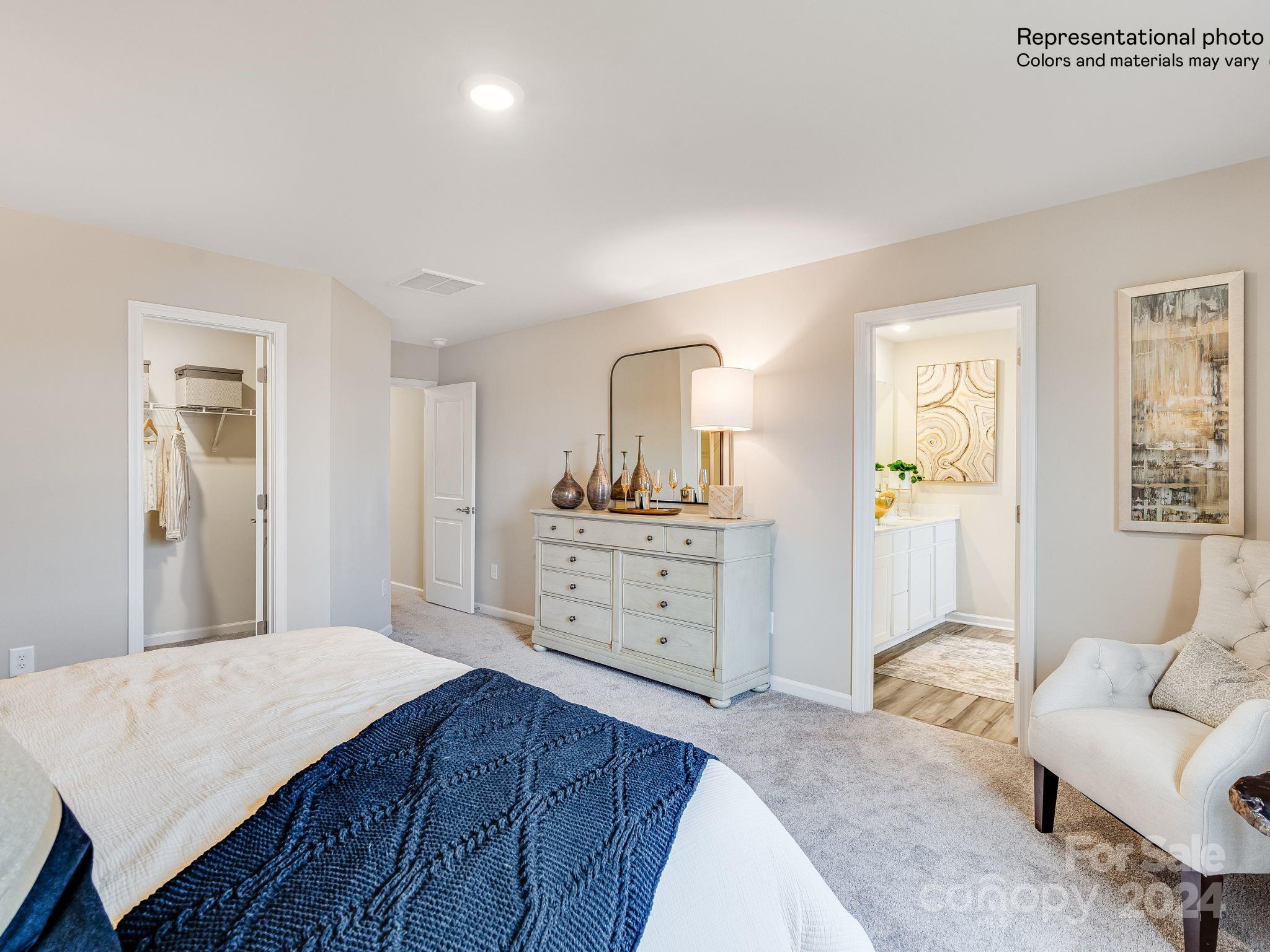 15126 Windy Plns Road Charlotte, NC 28262 - Photo 14 of 23 a spacious bedroom with a bed and a couch