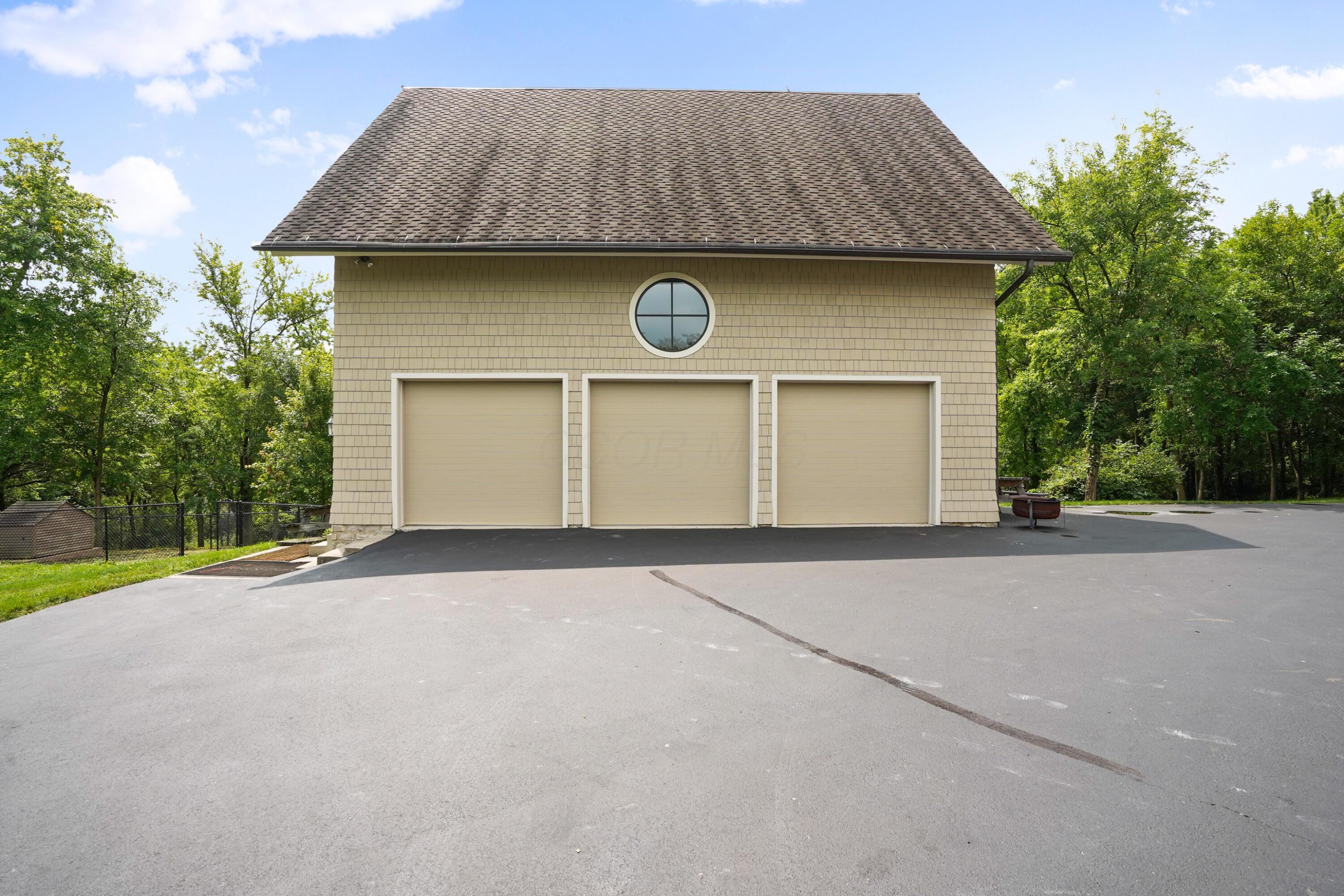 8108 Harriott Road Dublin, OH 43017 - Photo 11 of 71 Separate 3 car garage