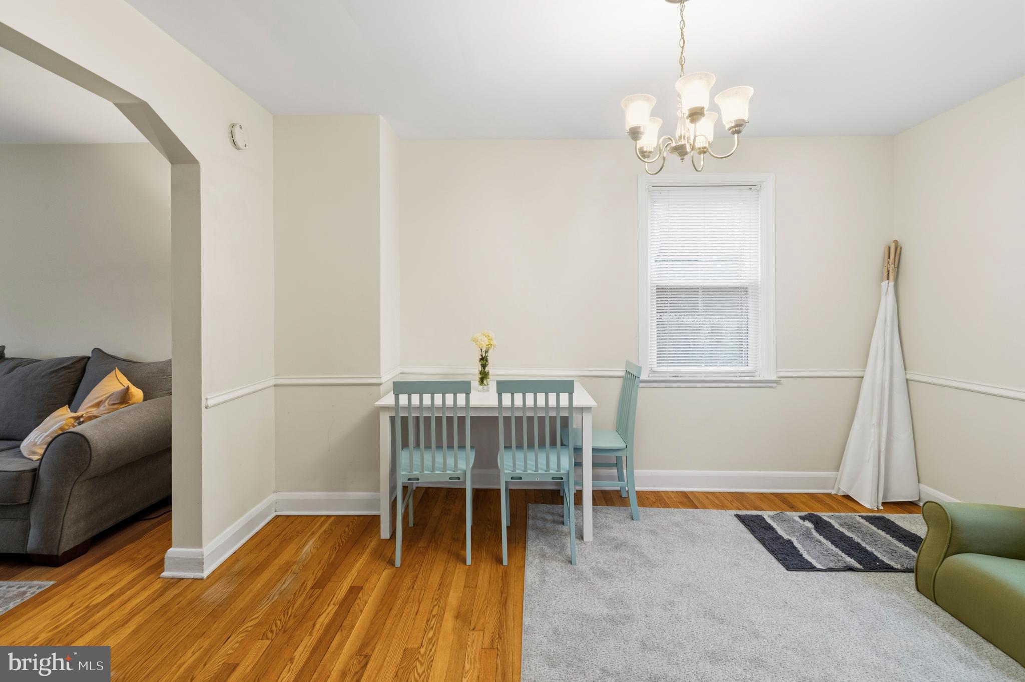 166 Cherrydell Road Baltimore, MD 21228 - Photo 11 of 24 a bedroom with furniture and a window