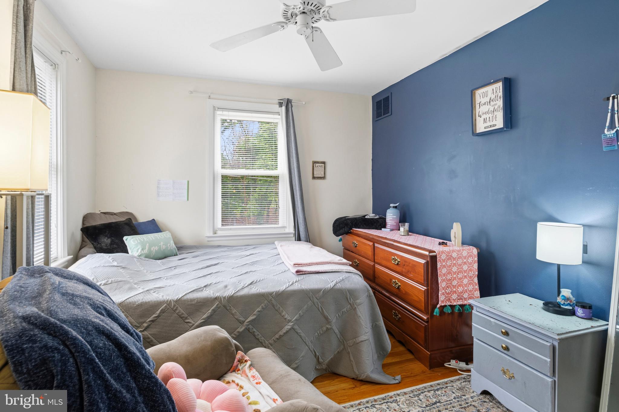166 Cherrydell Road Baltimore, MD 21228 - Photo 21 of 24 a bedroom with a bed and a window