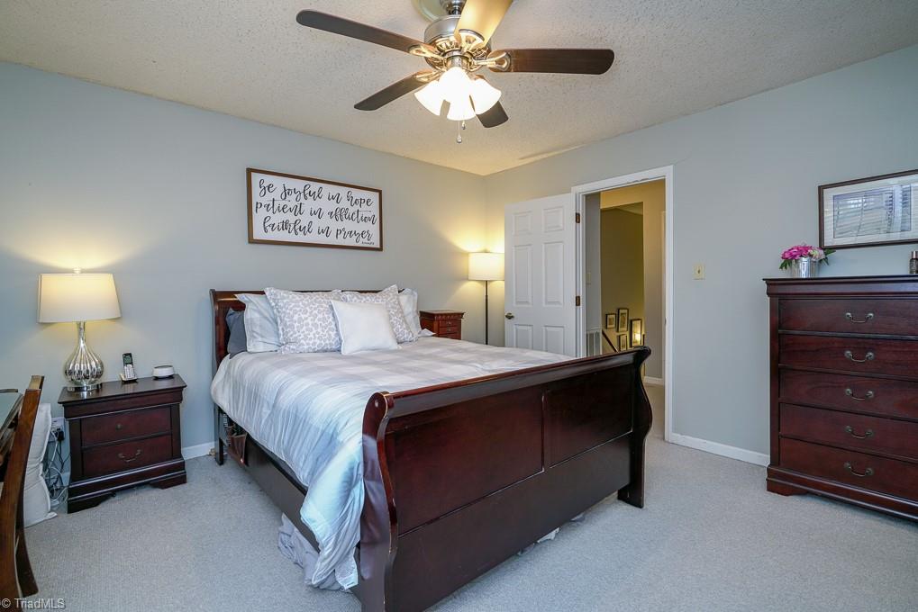 3843 Johnson Street, Unit D High Point, NC 27265 - Photo 11 of 29 Large primary bedroom with adjoining bath.