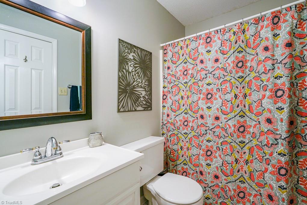 3843 Johnson Street, Unit D High Point, NC 27265 - Photo 14 of 29 Bathroom that connects the two upstairs bedrooms.