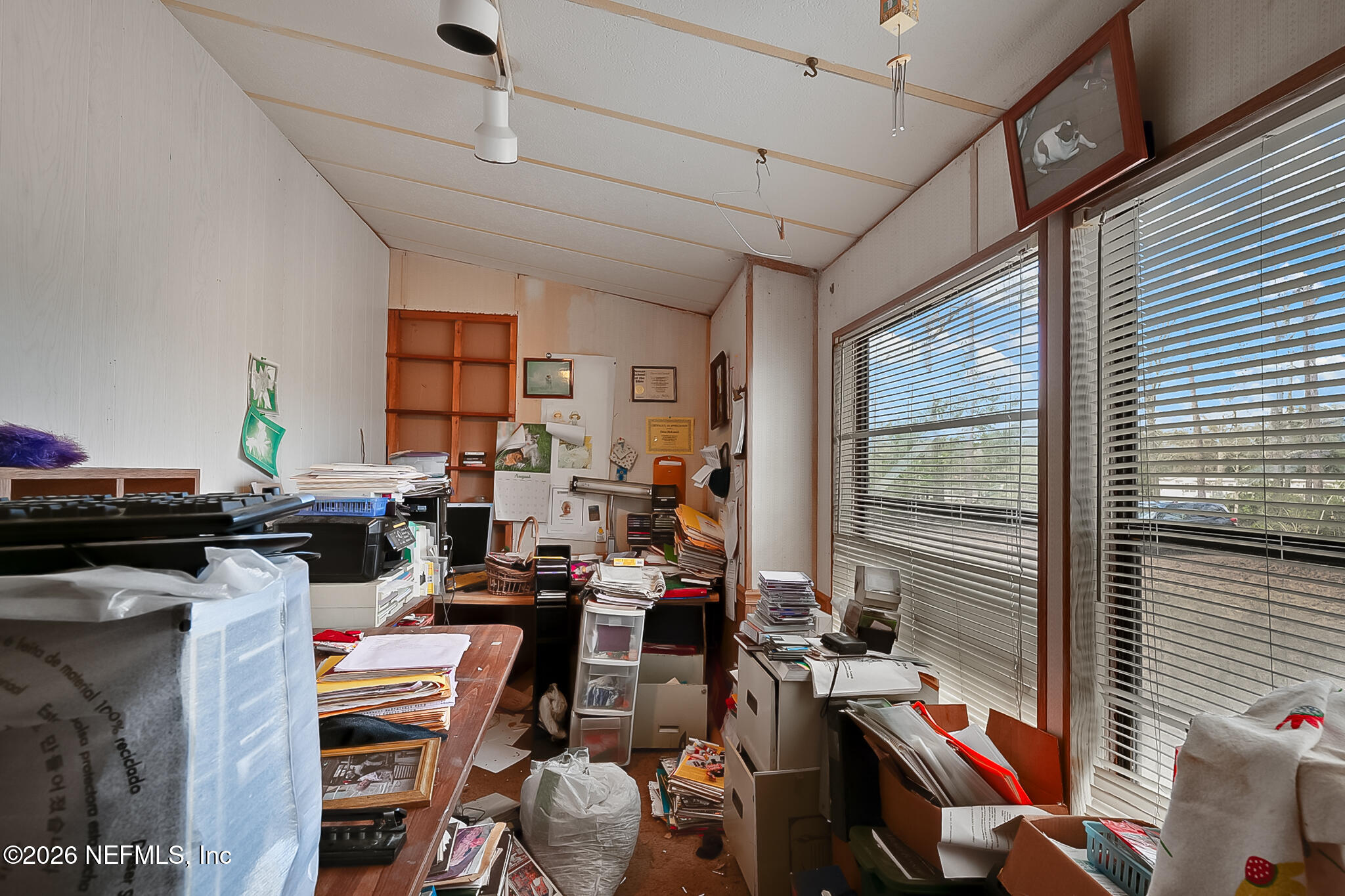 85110 Theresa Road Yulee, FL 32097 - Photo 11 of 24 a room with furniture and a window