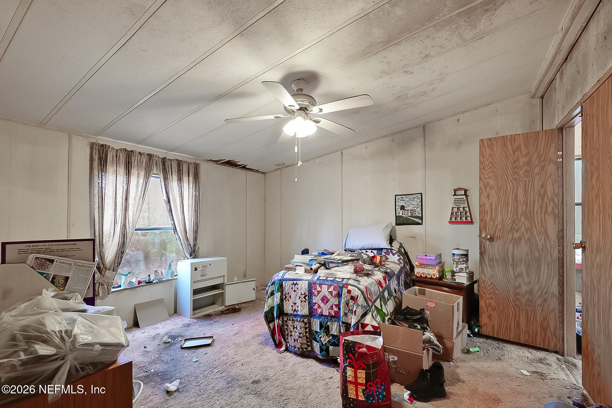 85110 Theresa Road Yulee, FL 32097 - Photo 12 of 24 a bedroom with bed and a window