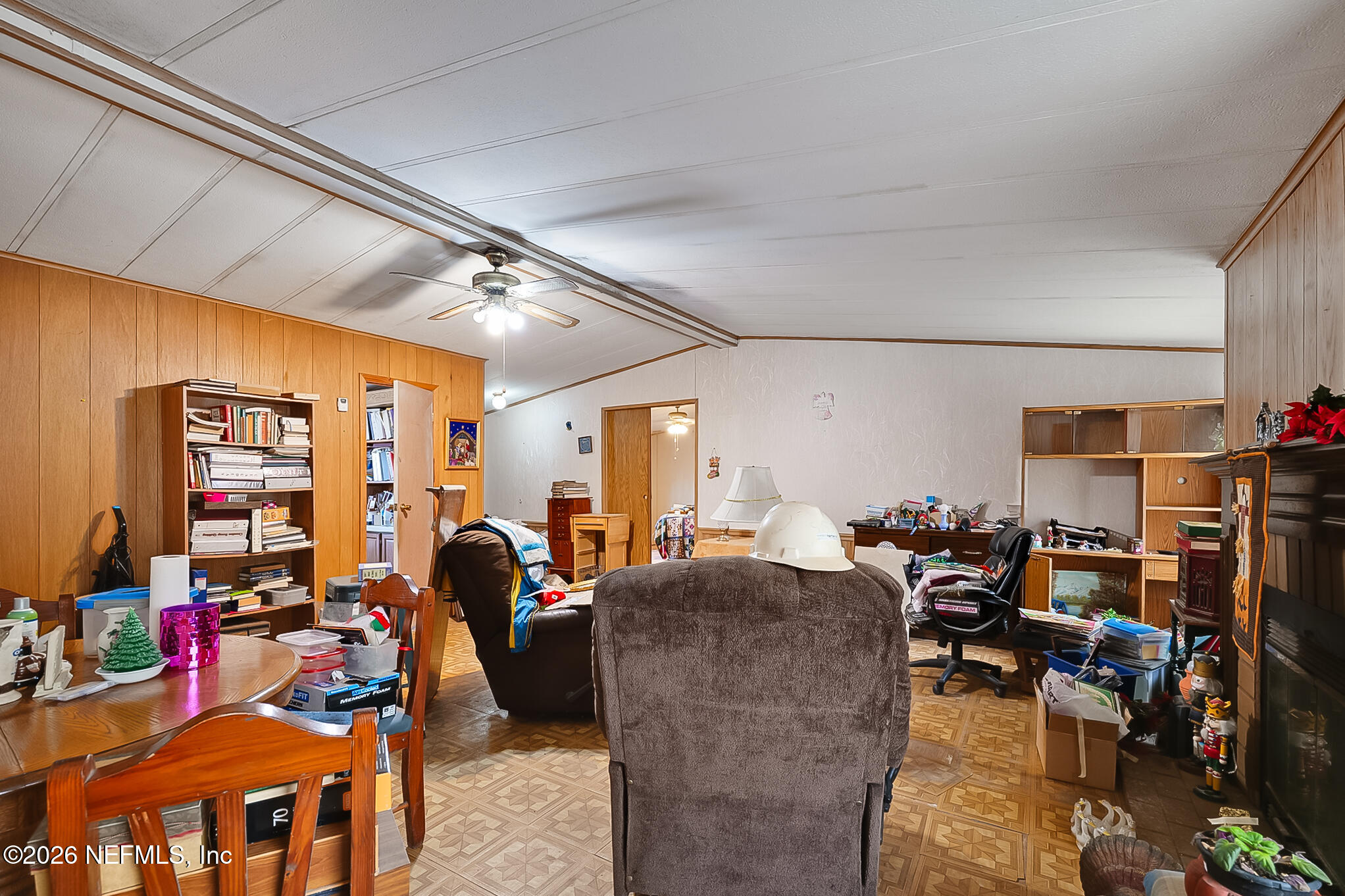85110 Theresa Road Yulee, FL 32097 - Photo 10 of 24 a living room with lots of furniture and a view of bedroom