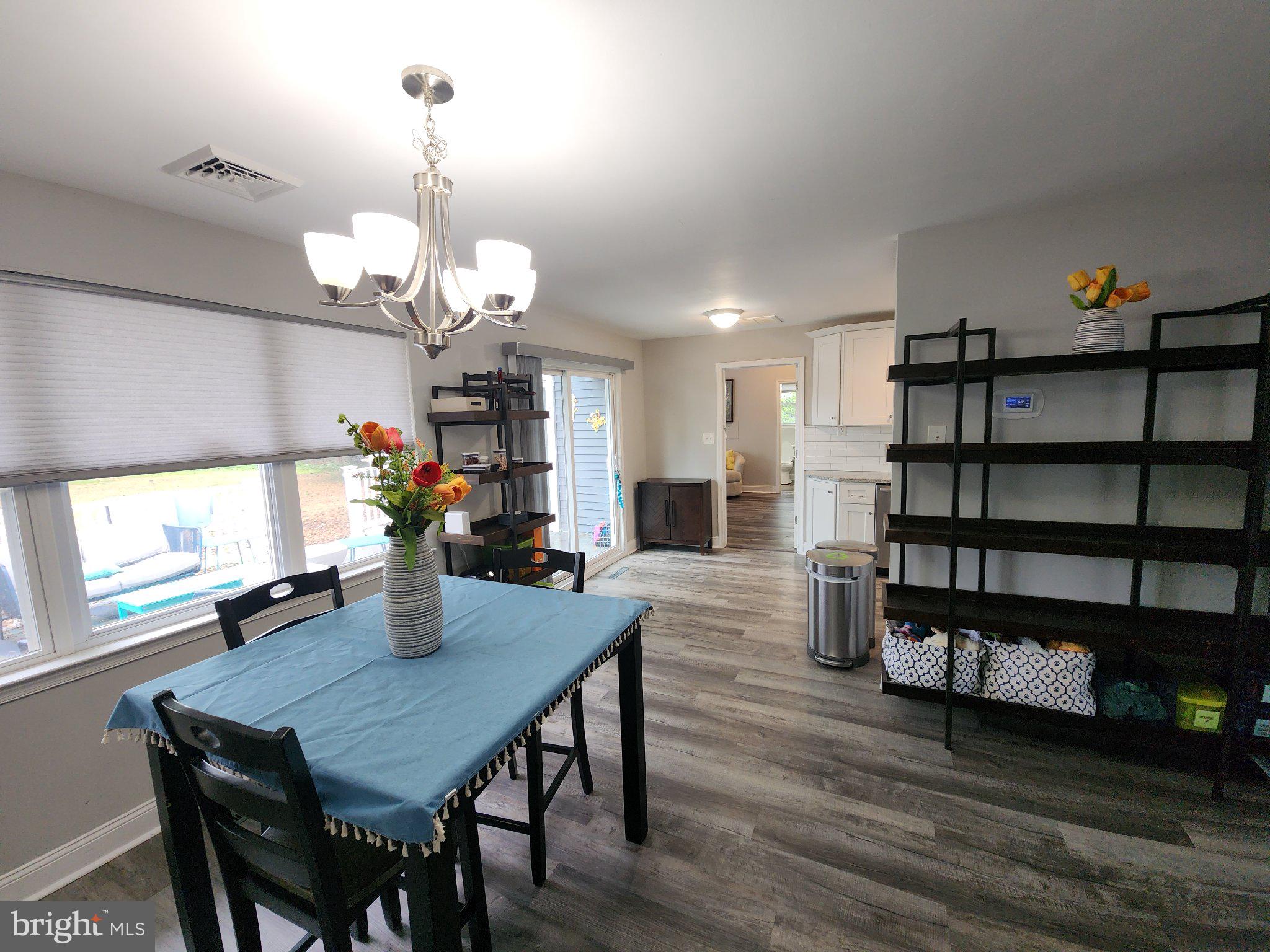 802 Devon Road Riverside, NJ 08075 - Photo 6 of 29 a view of a dining room with furniture and wooden floor