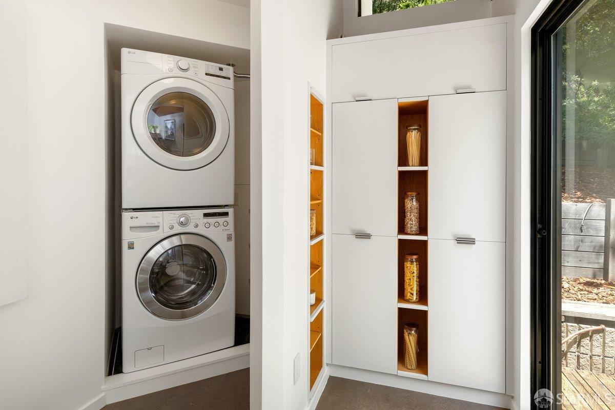 1824 Gouldin Road Oakland, CA 94611 - Photo 13 of 42 a view of a hallway with washer and dryer