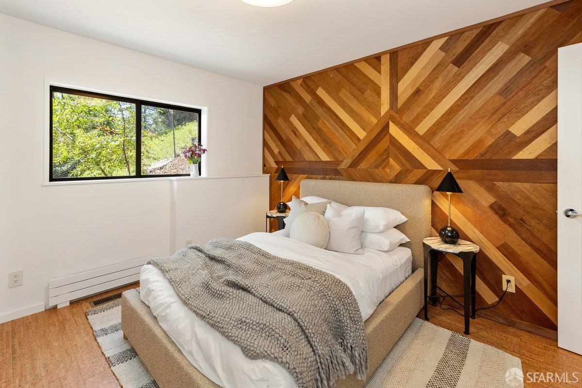 1824 Gouldin Road Oakland, CA 94611 - Photo 14 of 42 a bedroom with a bed and a window