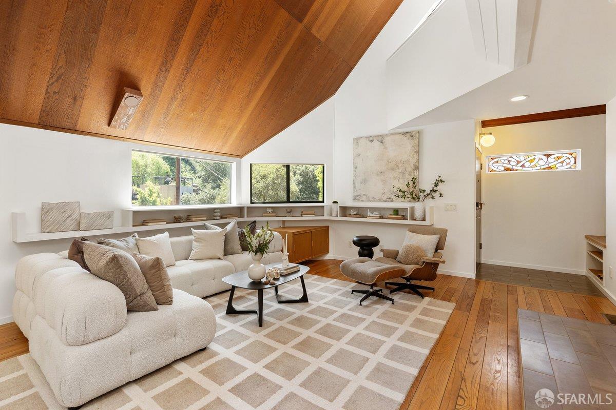 1824 Gouldin Road Oakland, CA 94611 - Photo 3 of 42 a living room with furniture and a large window