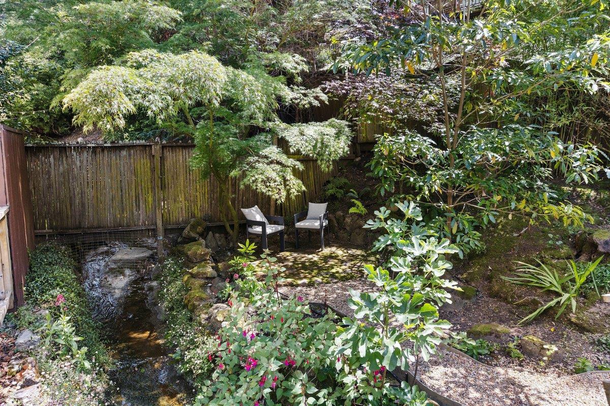 1824 Gouldin Road Oakland, CA 94611 - Photo 39 of 42 a backyard of a house with lots of green space