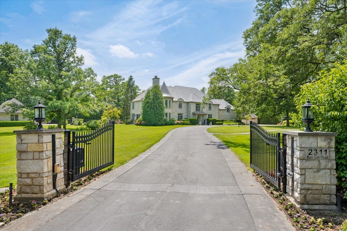 2311 Burr Oak Road Northfield, IL 60093 - Photo 1 of 69 a view of a swimming pool with a patio