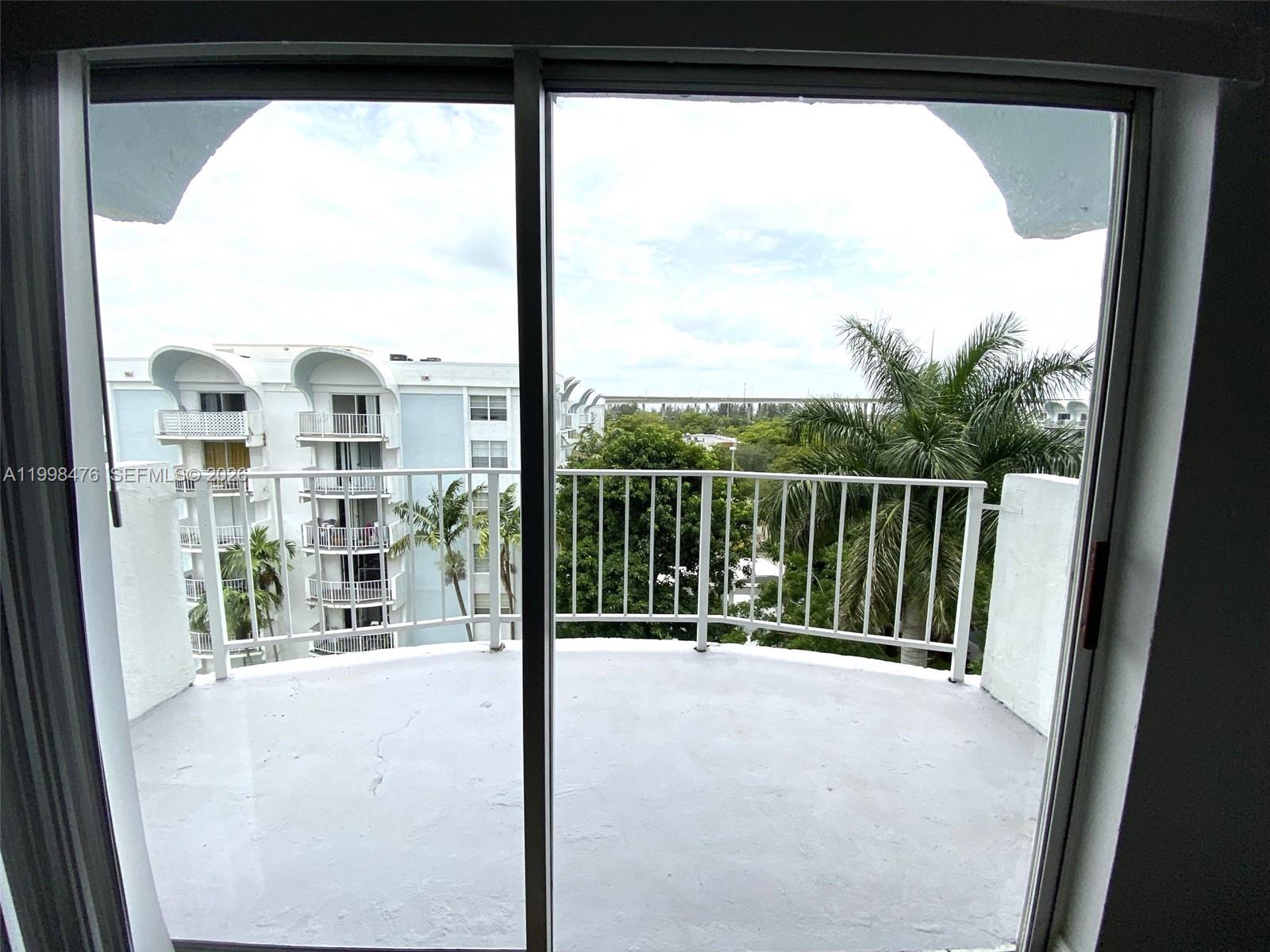 494 Northwest 165th Street, Unit C601 Miami, FL 33169 - Photo 11 of 22 a view of balcony with city view