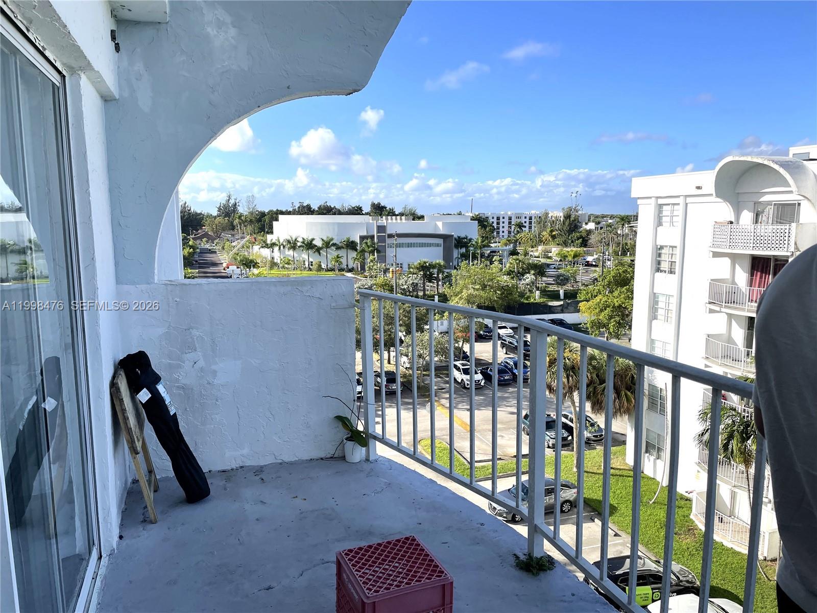 494 Northwest 165th Street, Unit C601 Miami, FL 33169 - Photo 13 of 22 a view of a balcony