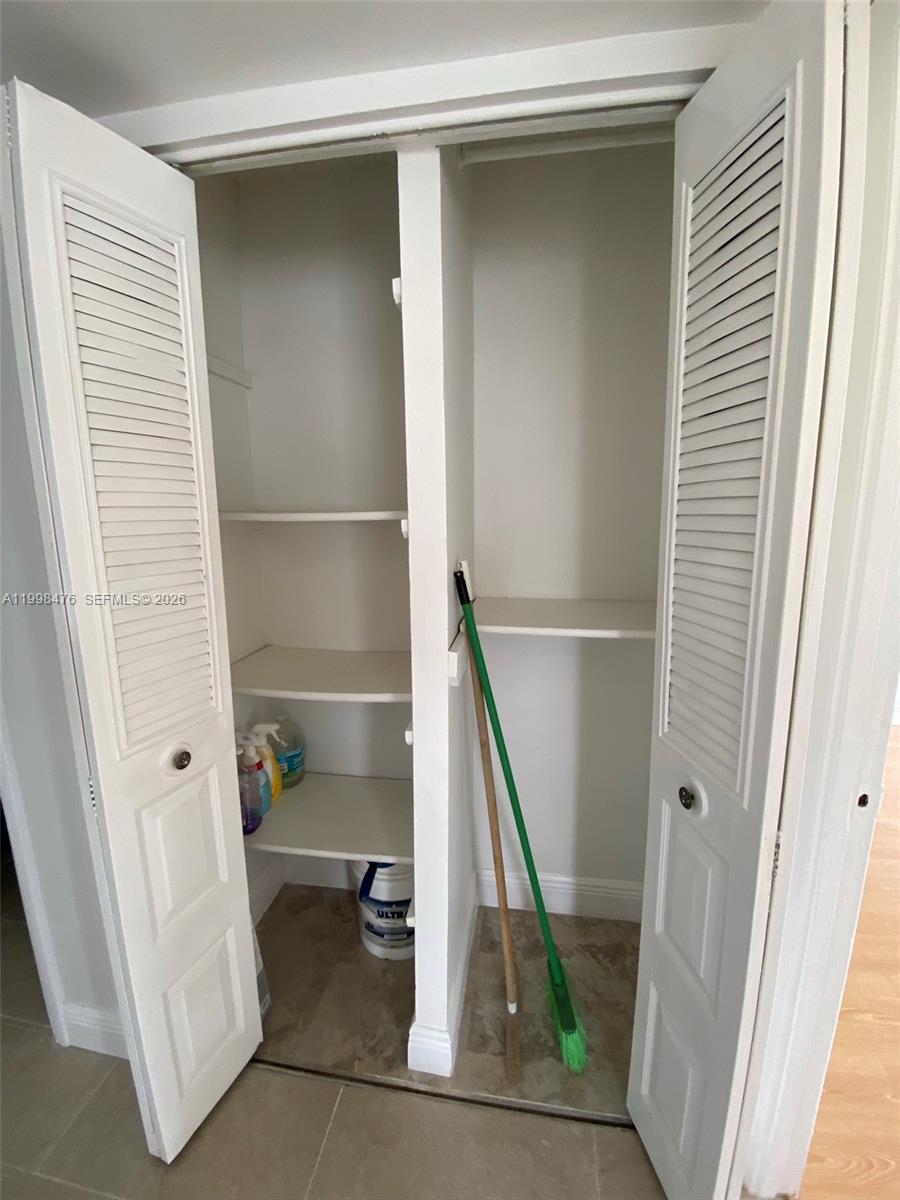 494 Northwest 165th Street, Unit C601 Miami, FL 33169 - Photo 15 of 22 a view of entryway with wooden floor