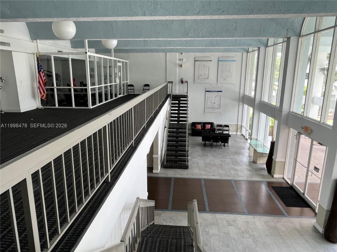 494 Northwest 165th Street, Unit C601 Miami, FL 33169 - Photo 5 of 22 a view of entryway and hall with wooden floor