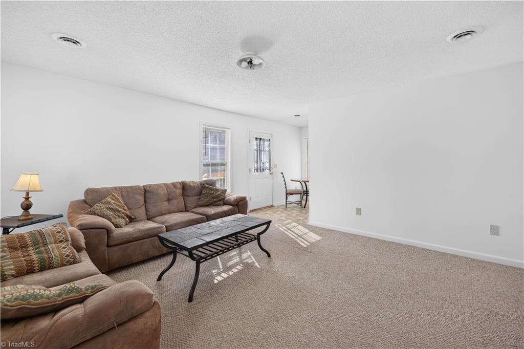 203 Jones School Road Mount Airy, NC 27030 - Photo 3 of 21 step into your spacious living room.