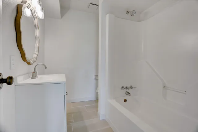 a view of a park with large trees