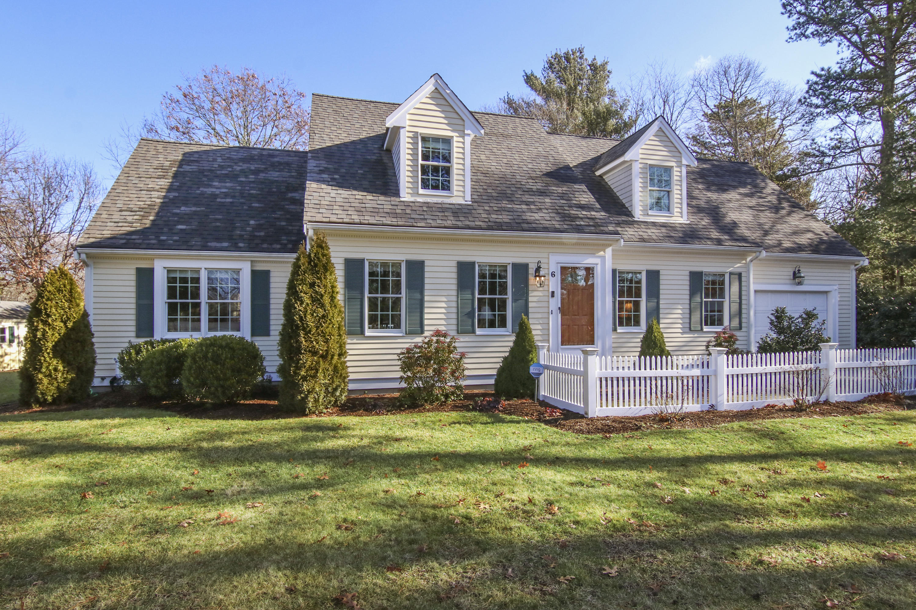6 Hogan Drive Mashpee, MA 02649 - Photo 1 of 30 a front view of a house with a yard and porch